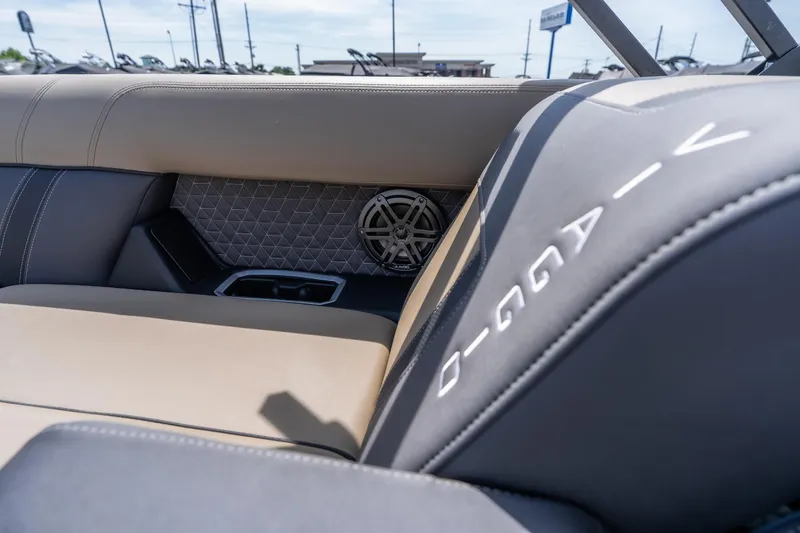 Slide: The Image of Luxurious interior of 2026 Viaggio Z24U boat with stylish seating and speaker detail. - 12
