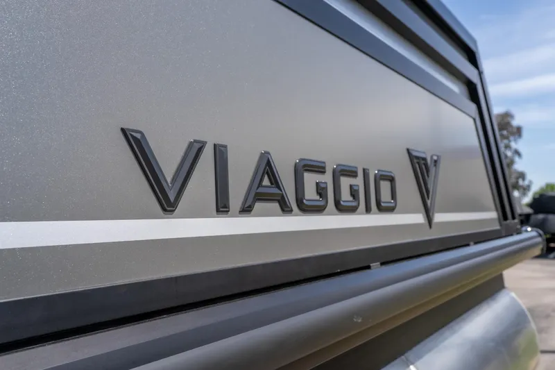 Slide: The Image of 2026 Viaggio Z24U logo on sleek metallic surface, showcasing modern design. - 3