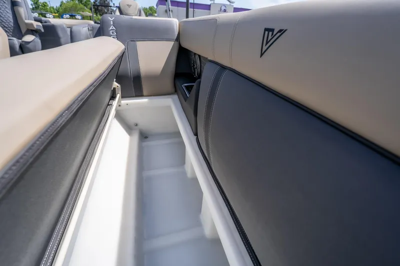 Slide: The Image of Interior storage compartment of 2026 Viaggio Z24U boat, featuring sleek seating design. - 6