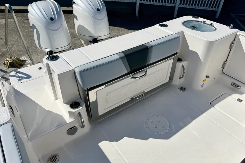 Slide: The Image of 2026 Robalo R270 Center Console boat with dual engines and spacious deck layout. - 15