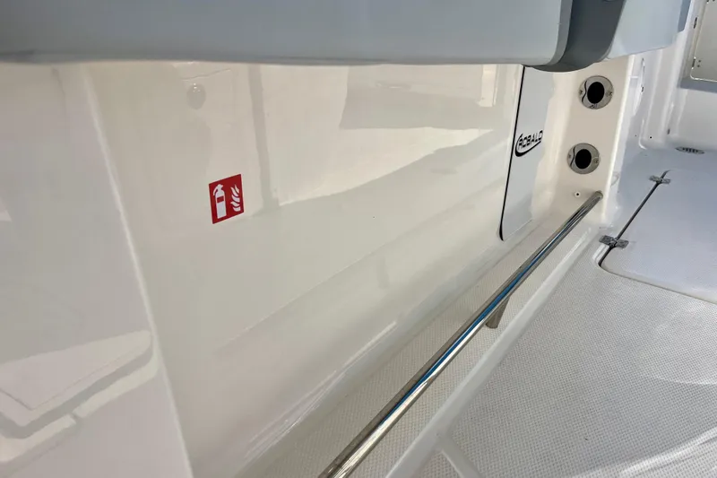 Slide: The Image of 2026 Robalo R270 Center Console interior with safety features and sleek design. - 25