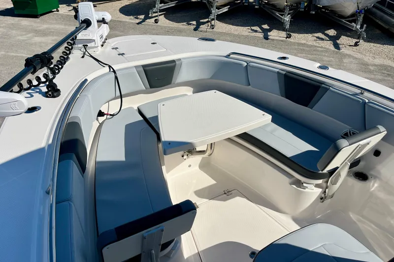 Slide: The Image of 2026 Robalo R270 Center Console boat interior with seating and table. - 43