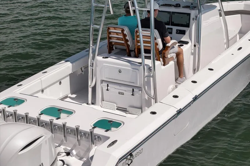 Slide: The Image of 2025 Marquesa 34 boat on water, featuring modern design and dual seating. - 19
