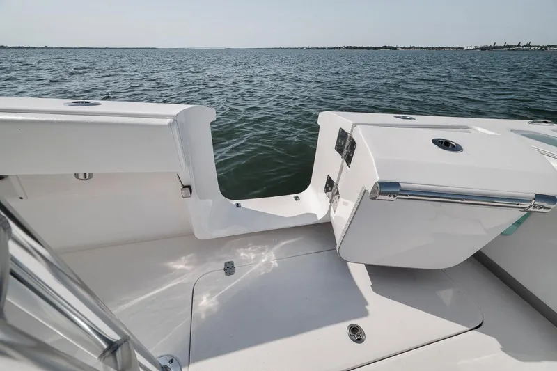 Slide: The Image of Sleek Marquesa 34 boat deck, 2025 model, overlooking calm ocean waters. - 59