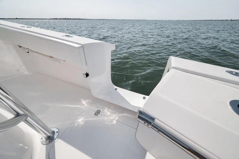 Slide: The Image of 2025 Marquesa 34 boat deck overlooking calm ocean waters. - 60
