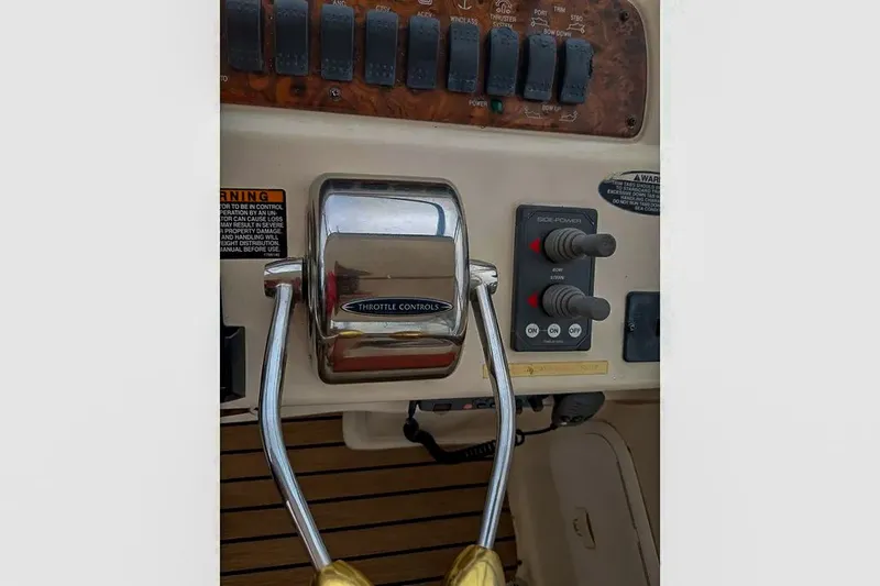 Slide: The Image of Control panel of a 2004 Meridian 411 Sedan boat. - 16