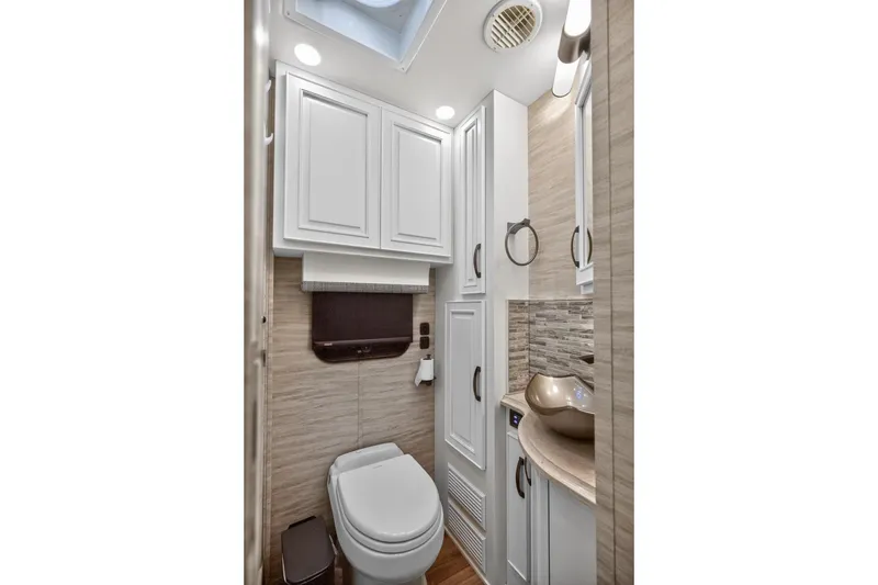 Slide: The Image of Luxurious bathroom in 2025 Newmar Dutch Star 4340 RV with modern fixtures and elegant design. - 20