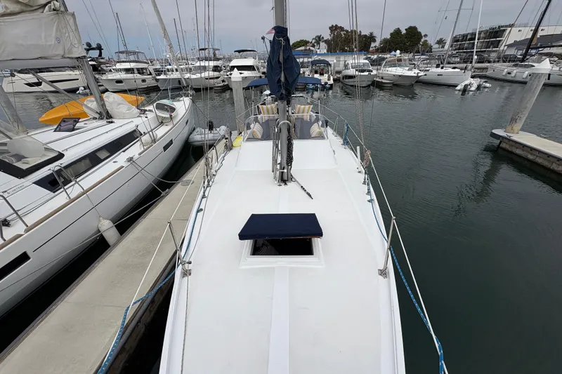 Slide: The Image of 1972 Coronado Yachts 35 Center Cockpit sailboat docked in a marina. - 12