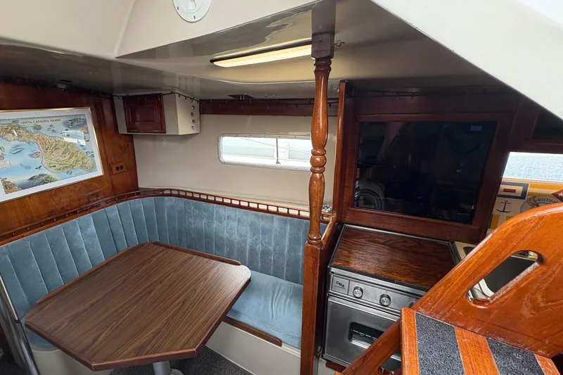 Slide: The Image of Interior of 1972 Coronado Yachts 35 Center Cockpit with dining area and kitchen. - 15