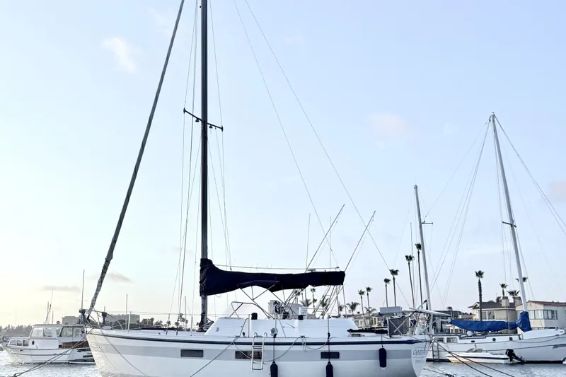 Slide: The Image of 1972 Coronado Yachts 35 Center Cockpit sailboat docked in a marina. - 2