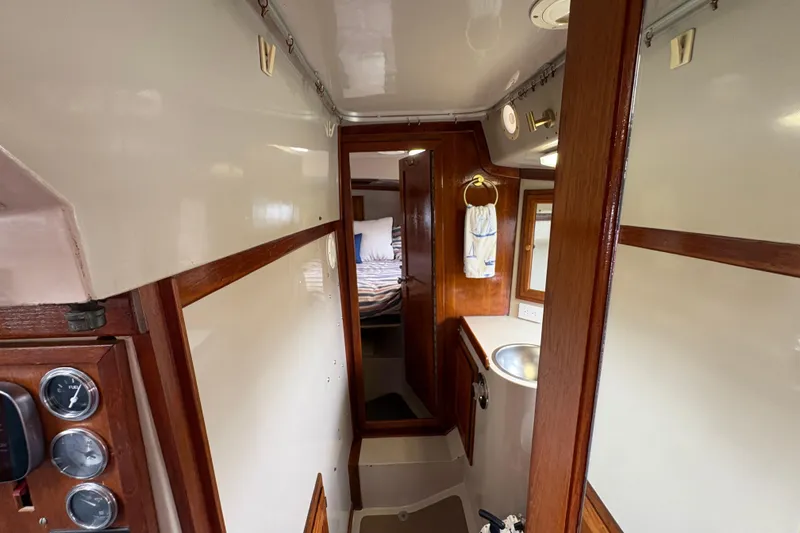 Slide: The Image of Interior of 1972 Coronado Yachts 35 Center Cockpit with wood accents and cozy cabin. - 28