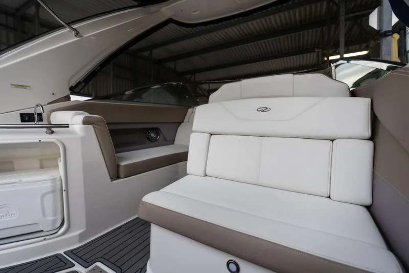 Slide: The Image of 2016 Regal 28 Express boat interior with white seating and modern design. - 41