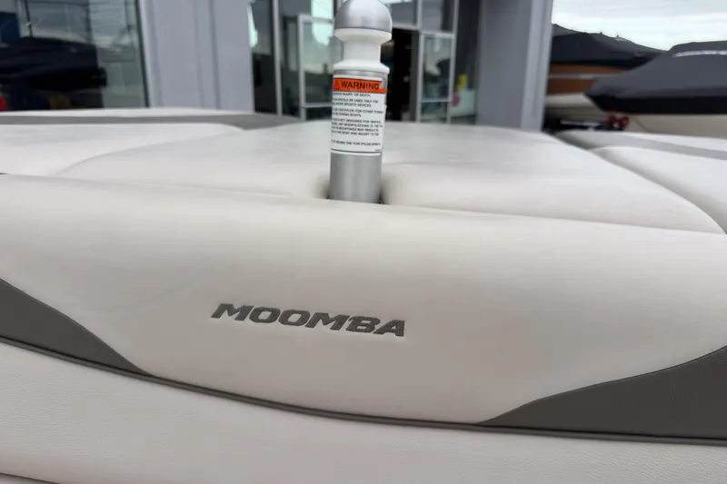 Slide: The Image of 2008 Moomba Mobius LSV boat interior with logo and warning label. - 13