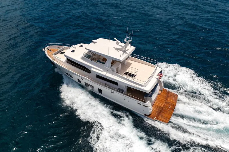 Slide: The Image of Luxurious 2027 Offshore Yachts 70 CE cruising on open ocean waters. - 3