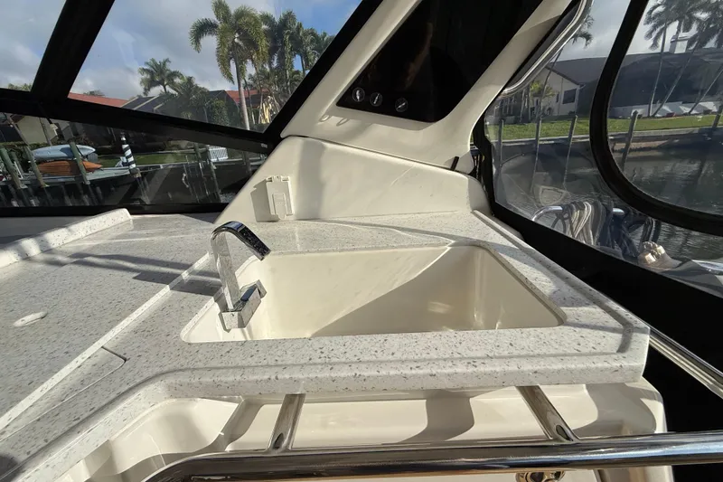 Slide: The Image of Interior view of 2019 Aquila 36 Sport yacht featuring a sleek countertop and sink. - 24