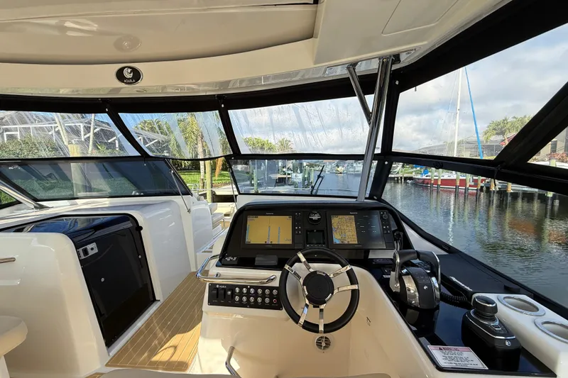 Slide: The Image of Interior view of 2019 Aquila 36 Sport yacht cockpit with navigation controls. - 30