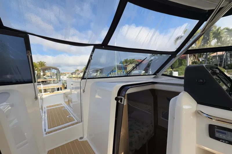 Slide: The Image of Interior view of 2019 Aquila 36 Sport yacht with open cabin and clear sky. - 38