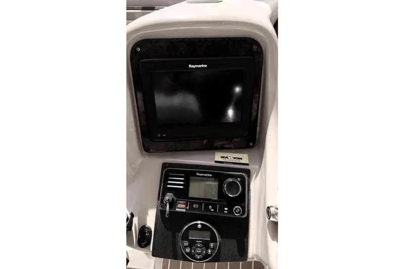 Slide: The Image of Control panel of a 2004 Sea Ray 340 Sundancer boat with Raymarine electronics. - 9