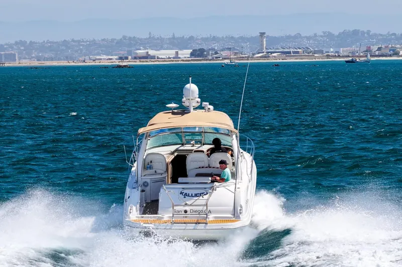 Slide: The Image of 2004 Sea Ray 340 Sundancer cruising in San Diego waters. - 58