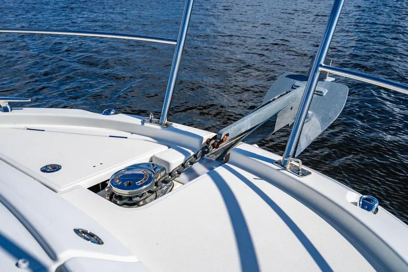 Slide: The Image of 2023 Jeanneau NC 1095 boat anchor system on calm water. - 33