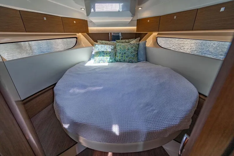 Slide: The Image of Luxurious cabin interior of 2023 Jeanneau NC 1095 boat with cozy bedding. - 54