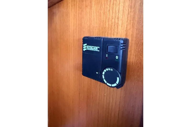 Slide: The Image of Espar heater control panel on 1987 Norseman 400 wooden interior. - 71