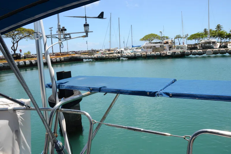 Slide: The Image of Sailboat docked in marina, Norseman 400, 1987 model, calm waters, clear sky. - 17