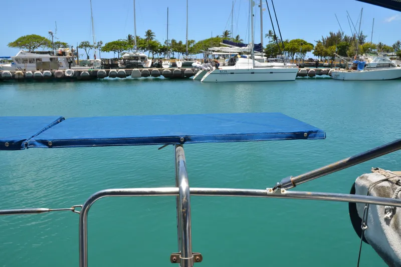 Slide: The Image of Marina view from 1987 Norseman 400 sailboat, featuring calm waters and docked boats. - 18