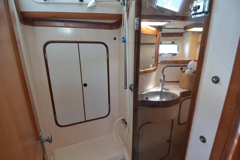 Slide: The Image of Bathroom interior of 1987 Norseman 400 yacht with shower and sink. - 26