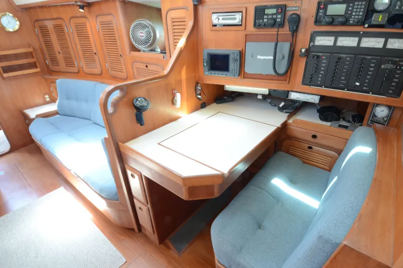 Slide: The Image of Interior of 1987 Norseman 400 yacht with navigation station and seating area. - 33