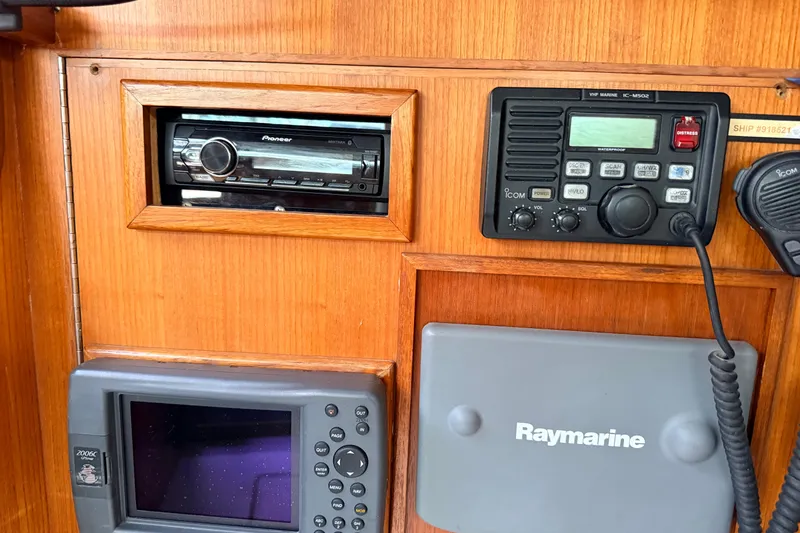 Slide: The Image of Control panel of a 1987 Norseman 400 yacht with radio and navigation equipment. - 66