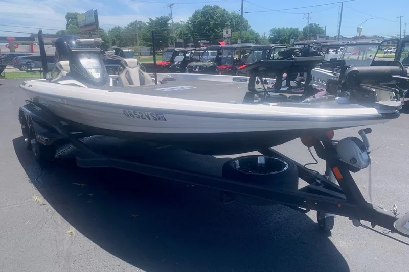 Slide: The Image of 2020 Skeeter FXR21 boat on trailer in outdoor dealership lot. - 10