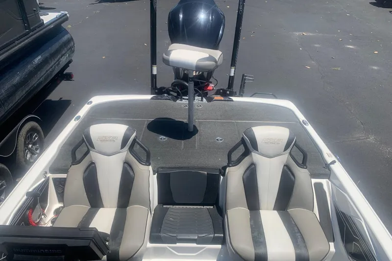 Slide: The Image of 2020 Skeeter FXR21 boat interior with dual seats and fishing platform. - 6