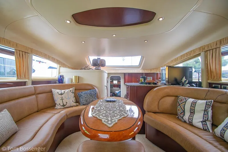 Slide: The Image of Luxurious interior of 2005 Sea Ray 390 Motor Yacht with elegant seating and decor. - 8