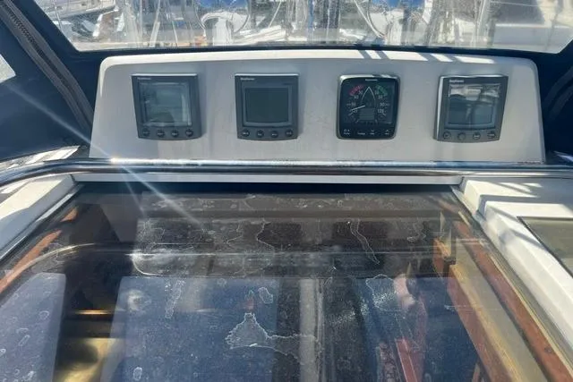 Slide: The Image of Control panel of a 2002 Sabre 452 yacht with navigation instruments. - 11