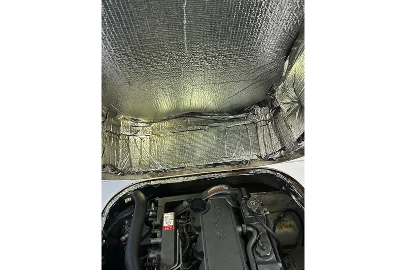 Slide: The Image of Engine compartment of a 2000 Albin 28 Tournament Express with insulation. - 10