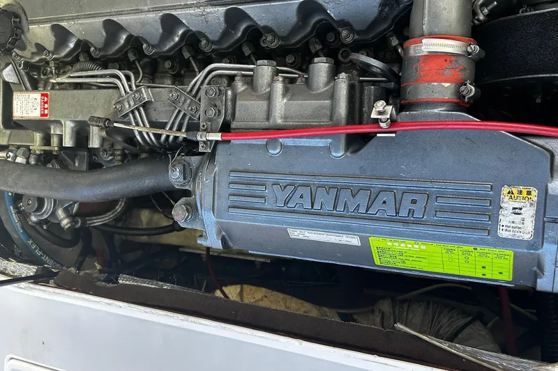 Slide: The Image of Engine of a 2000 Albin 28 Tournament Express with Yanmar branding visible. - 13