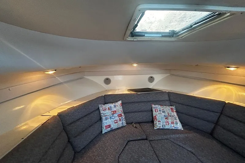 Slide: The Image of Interior cabin of 2000 Albin 28 Tournament Express with cushions and overhead hatch. - 40