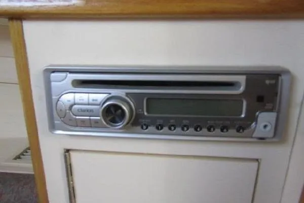 Slide: The Image of Built-in stereo system on a 2000 Albin 28 Tournament Express boat interior. - 42