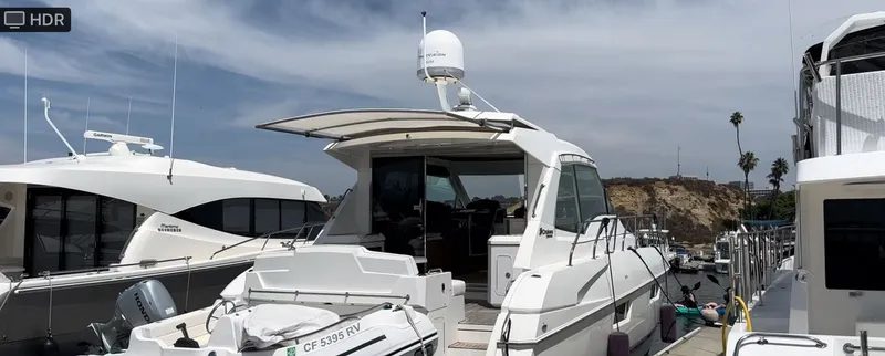 Slide: The Image of 2014 Cruisers Yachts 48 Cantius docked on a sunny day. - 21
