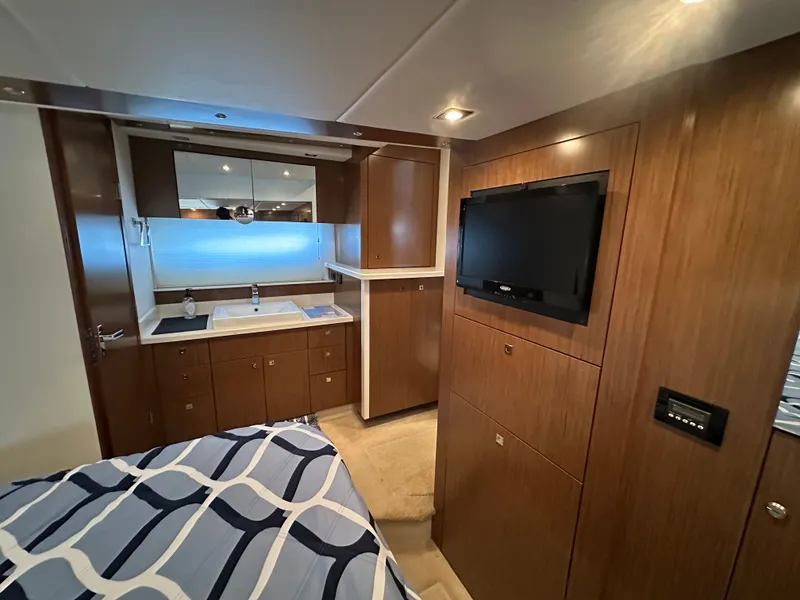 Slide: The Image of Luxurious cabin of 2014 Cruisers Yachts 48 Cantius with TV and sink. - 23