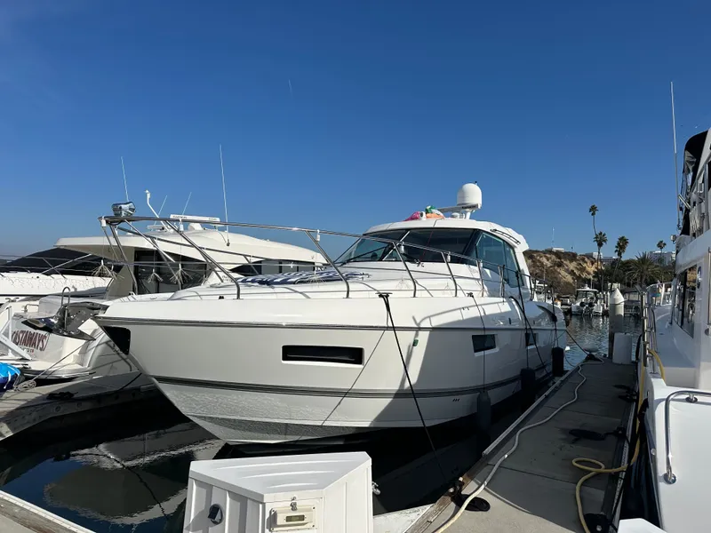 Slide: The Image of 2014 Cruisers Yachts 48 Cantius docked at marina. - 43