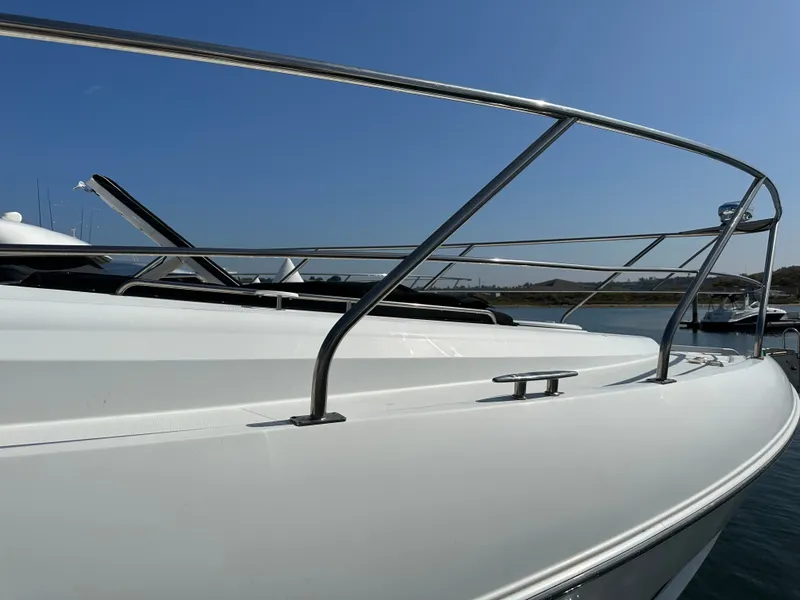Slide: The Image of 2014 Cruisers Yachts 48 Cantius on calm water. - 48