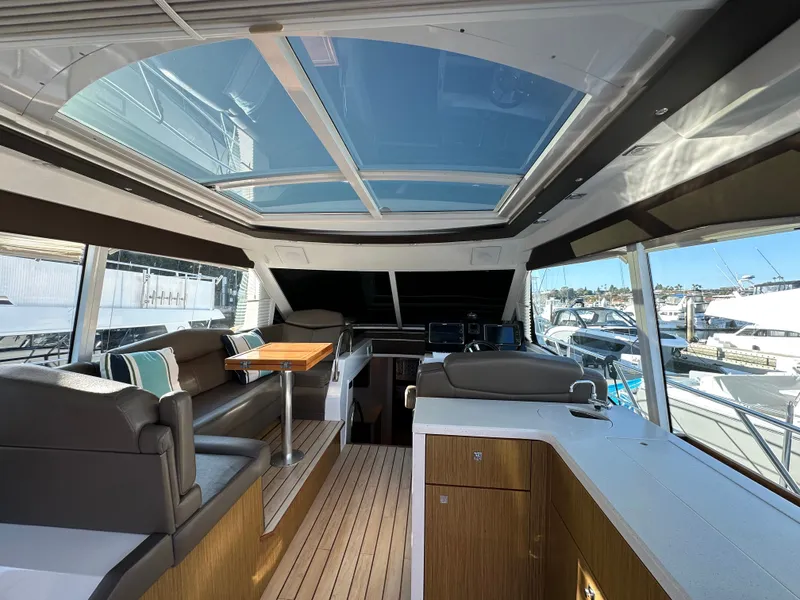 Slide: The Image of Interior of a 2014 Cruisers Yachts 48 Cantius with panoramic roof. - 5