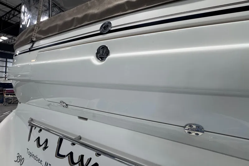 Slide: The Image of 2004 Sea Ray 390 Motor Yacht in a spacious indoor storage facility. - 1