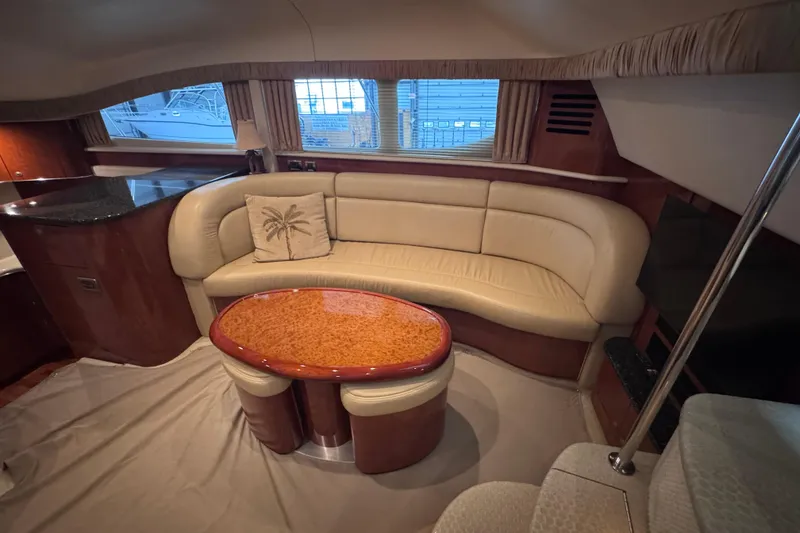 Slide: The Image of Cockpit of 2004 Sea Ray 390 Motor Yacht with Garmin navigation system and wooden steering wheel. - 13