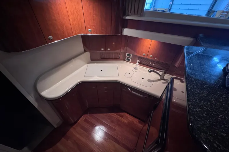 Slide: The Image of Luxurious bedroom interior of 2004 Sea Ray 390 Motor Yacht with elegant bedding. - 20