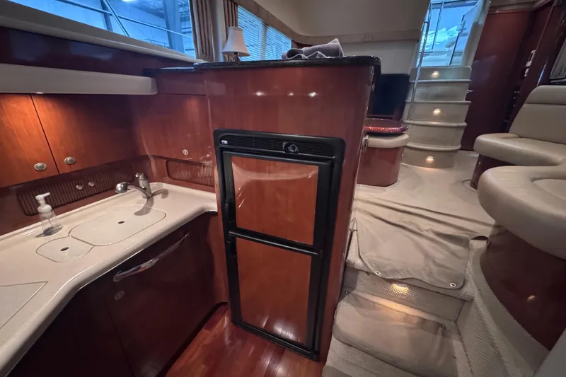Slide: The Image of Shower area in 2004 Sea Ray 390 Motor Yacht with porthole and toiletries. - 24