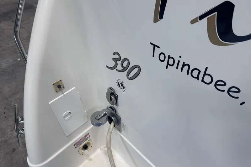 Slide: The Image of 2004 Sea Ray 390 Motor Yacht in indoor storage, rear view. - 3