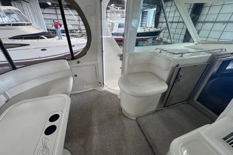Slide: The Image of Storage compartment of a 2004 Sea Ray 390 Motor Yacht with coiled hoses and power cables. - 6